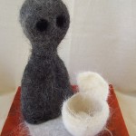 Figure with Egg